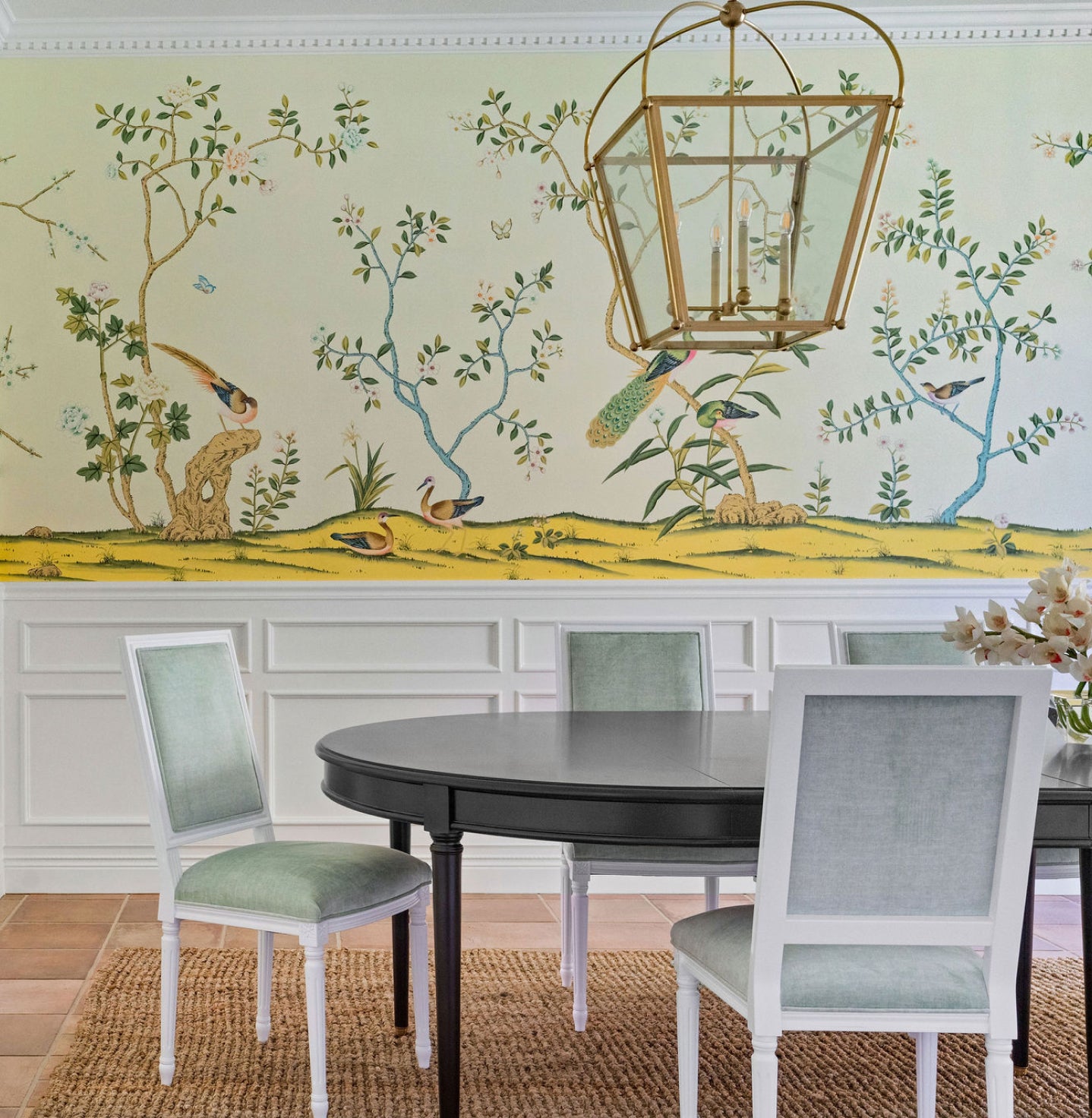 White King Louis XVI Square Back Dining Chairs in a wallpapered Dining Room. Custom upholstered chair made with a sea foam green velvet fabric.